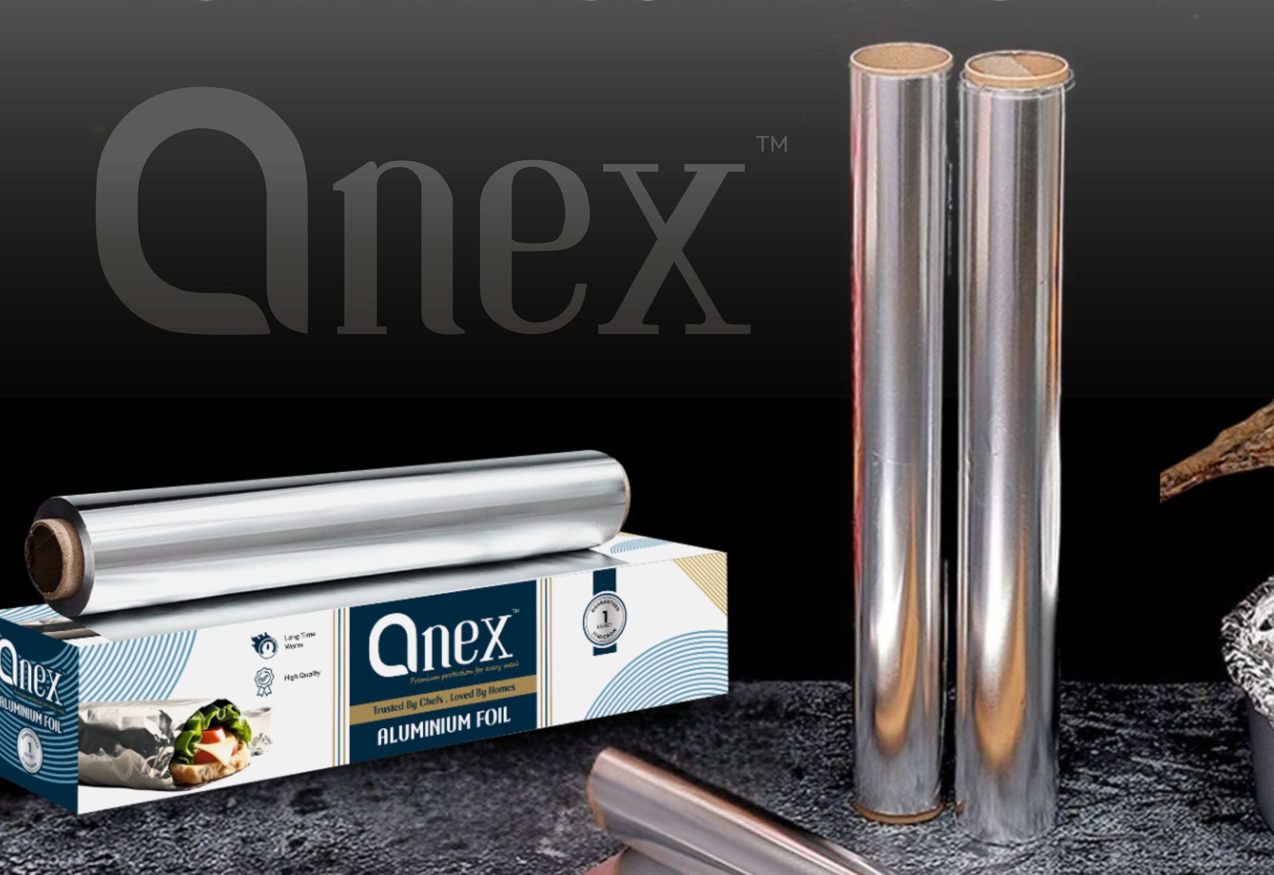 Orange robotic arms in a factory